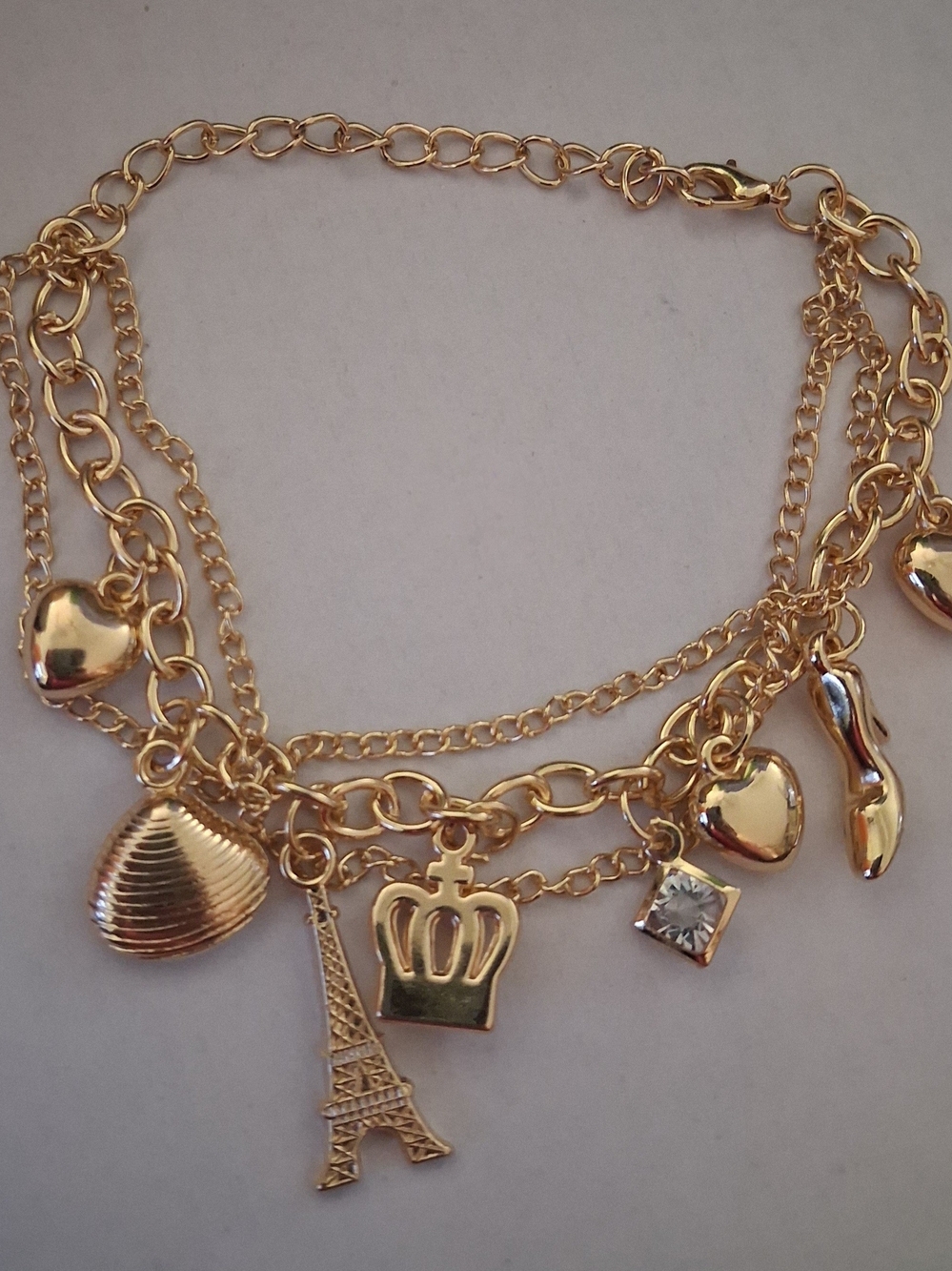 Gold Charm Layered Bracelet with Eiffel Tower and Crown